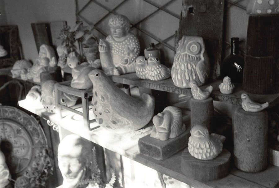 Group shot of many of Isabel Bloom's sculptures in a range of sizes from small to large.