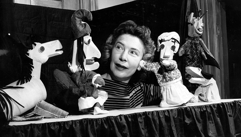 Isabel Bloom with clay created puppets