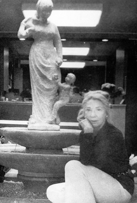 Isabel Bloom with one of her large mother and children sculptures