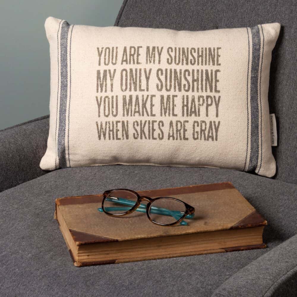A cotton and polyester pillow featuring a distressed You Are My Sunshine My Only Sunshine You Make Me Happy When Skies Are Gray sentiment with striped trim designs. Pillow -My Sunshine