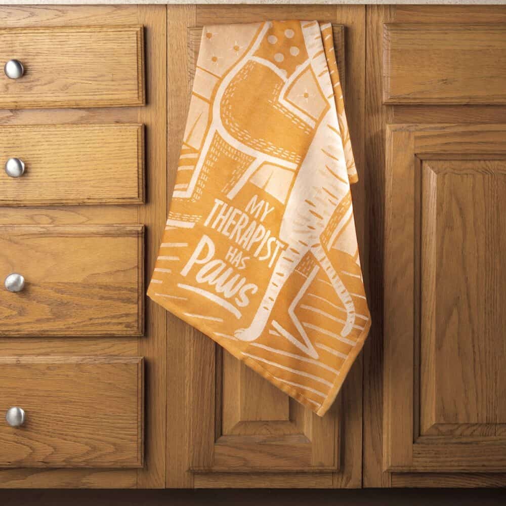 A jacquard woven kitchen towel featuring an all over design with My Therapist Has Paws sentiment and coordinating illustrations Towel -Cat Therapist