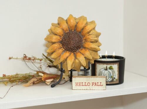 Sunflower with candle