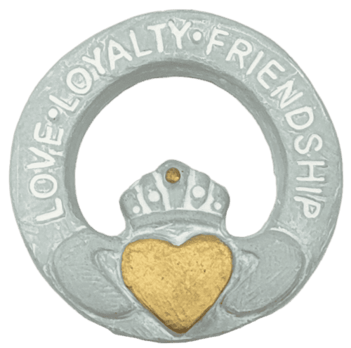 : 3 inch diameter Claddah with “Love, Loyalty and Friendship” engraved in a ring encircling a pair of hands clasping a heart with a crown