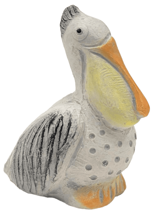 Pelican concrete sculpture with coastal accents by Isabel Bloom