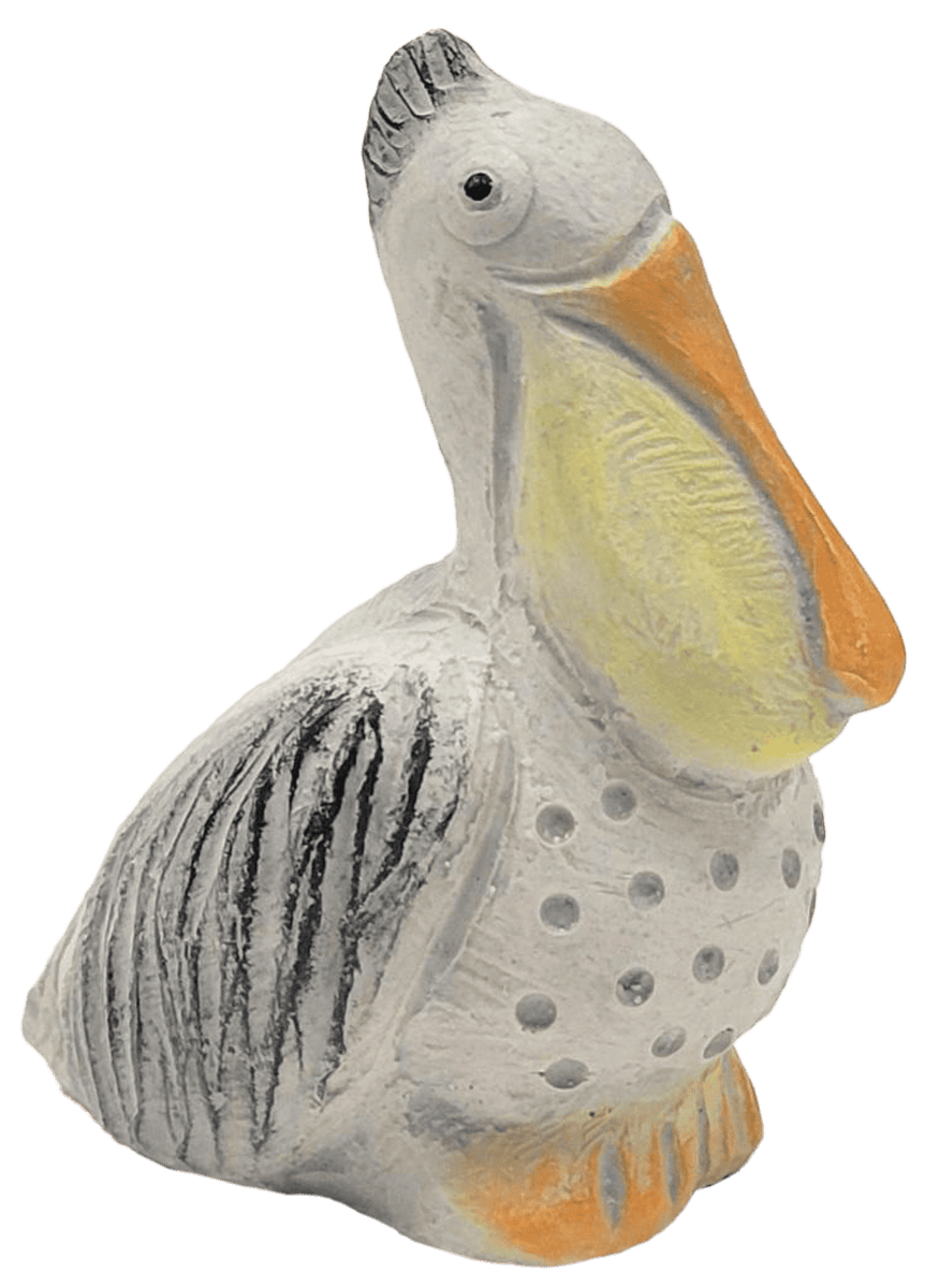 Pelican concrete sculpture with coastal accents by Isabel Bloom